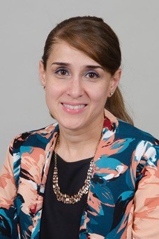 Portrait headshot of María I. Ortiz 