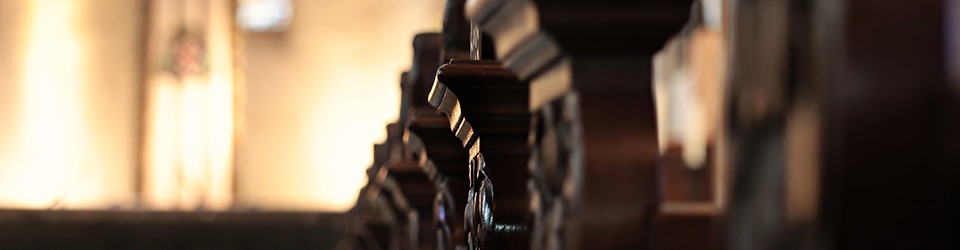 Close up of a line of pews 
