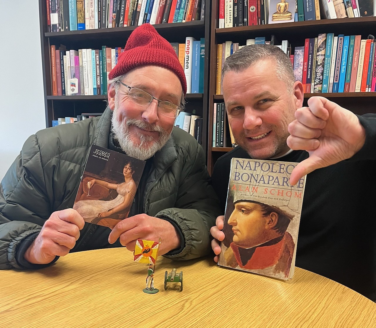 Professor Jeff and Willard hold Napoleon books 