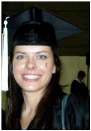 Sarah wearing graduation cap and gown