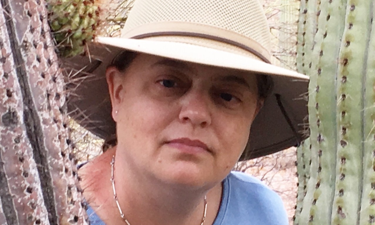 Prof. Rollmann in the desert with cactus