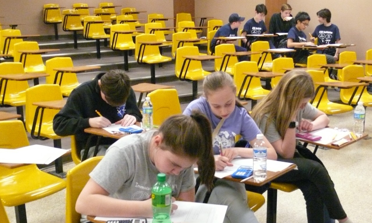 Math Bowl 2018 students working in a lecture hall