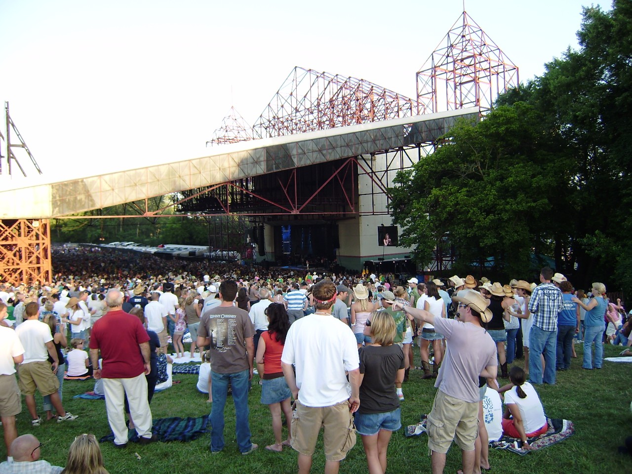View of Riverbend Music Center from the lawn seating area with a standing room only crowd