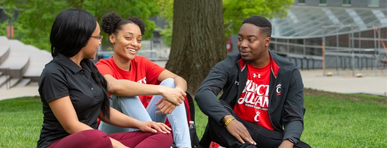 Students sitting on Bearcats Commons