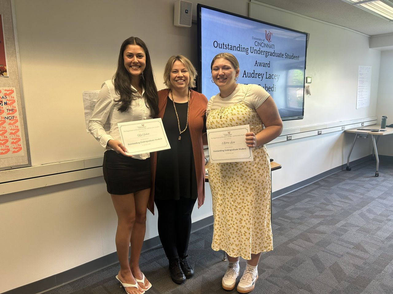 Picture of both Undergraduate Outstanding award winners with WGSS undergraduate director