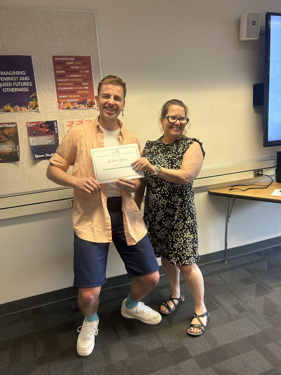 Outstanding Graduate Award Winner with WGSS Graduate director