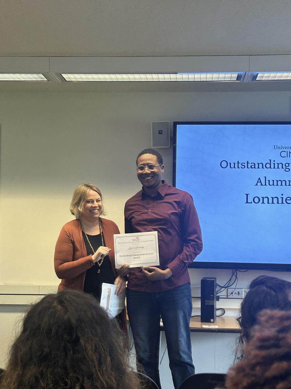 Outstanding Alumni award winner with WGSS undergraduate director