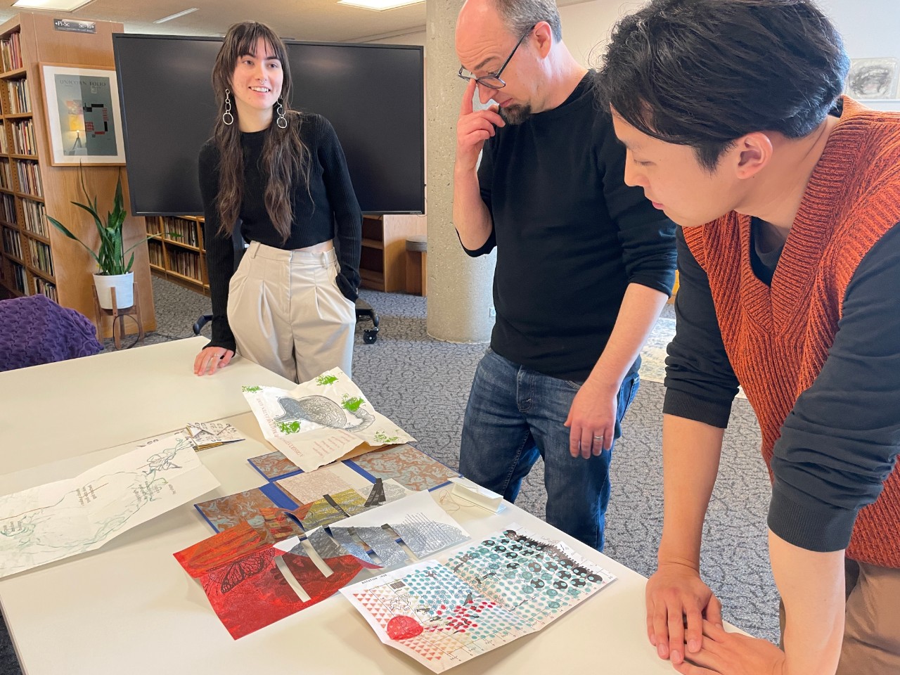 Aaron Cohick, New Lights Press, with consultant Andy Sia and iElliston Student Curator Lili Alimohammadi