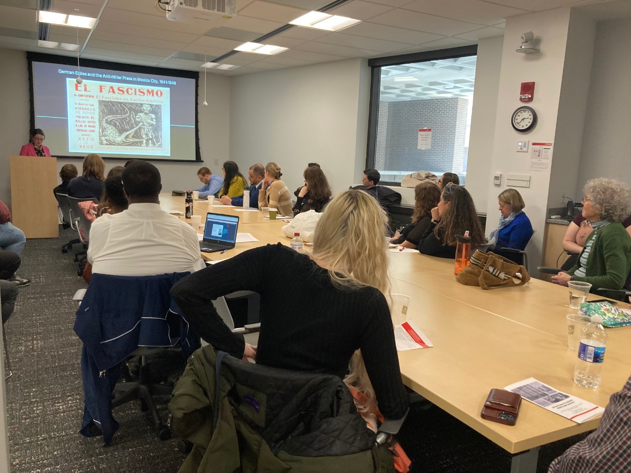 History faculty listening graduate student's talk