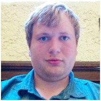 Adam wearing blue shirt