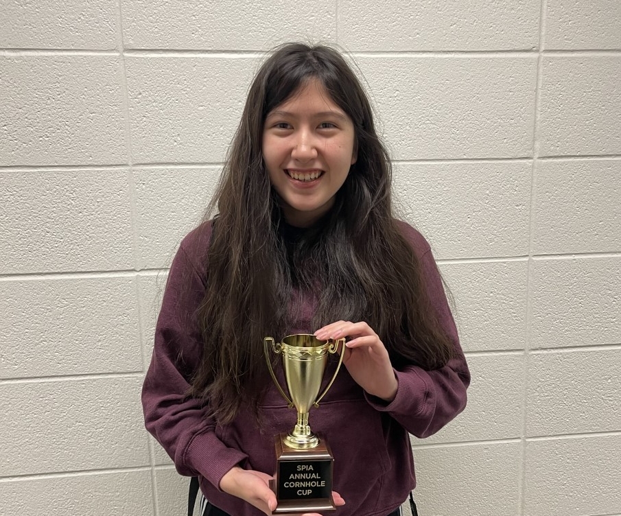 Lauren holding the trophy