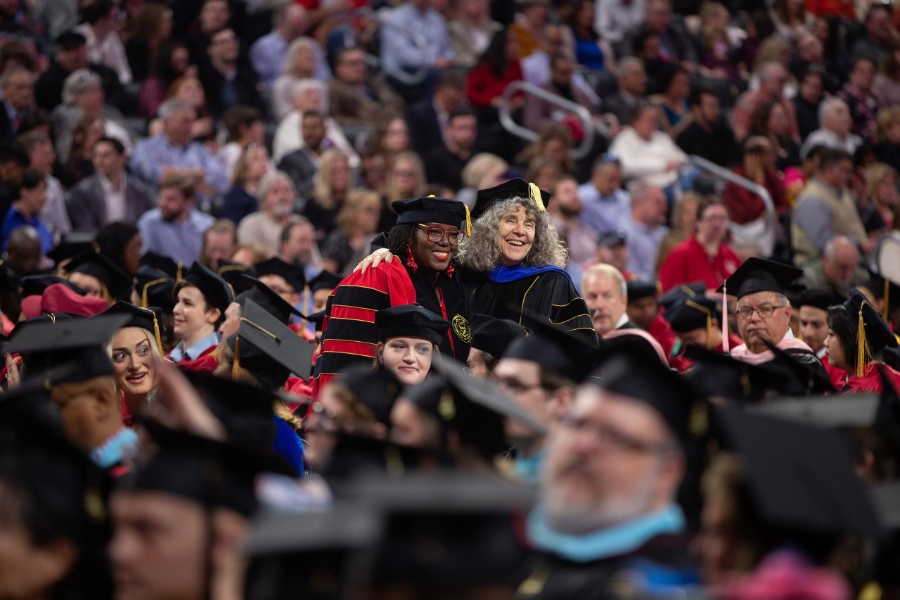 Student and faculty at this year's commencement